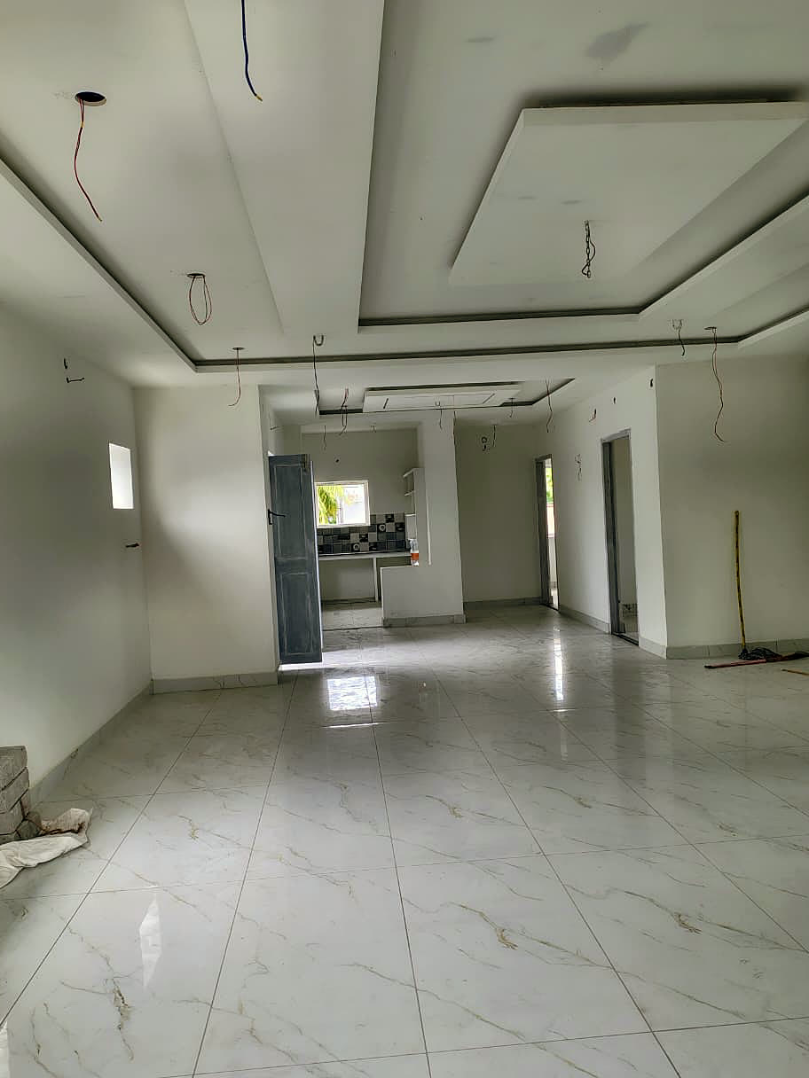 Spacious living and dining hall with false ceiling, 3BHK flat in Machilipatnam